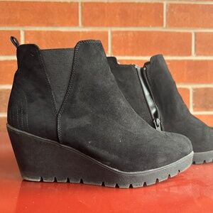 Wedge heeled boots